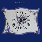 HORLOGE FAIENCE MODELE PARCHEMIN DECOR FLEURS BLEUES 